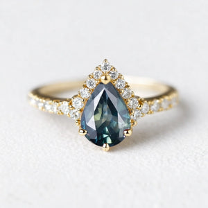Aurora’s Teardrop | Pear Blue Sapphire Half-Halo Ring.