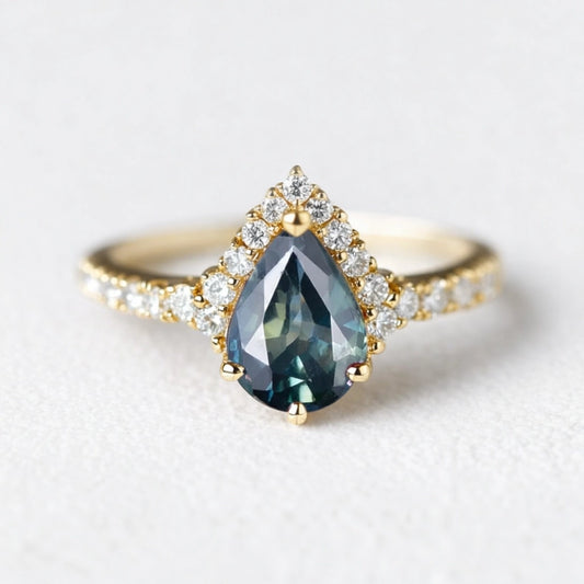 Aurora’s Teardrop | Pear Blue Sapphire Half-Halo Ring