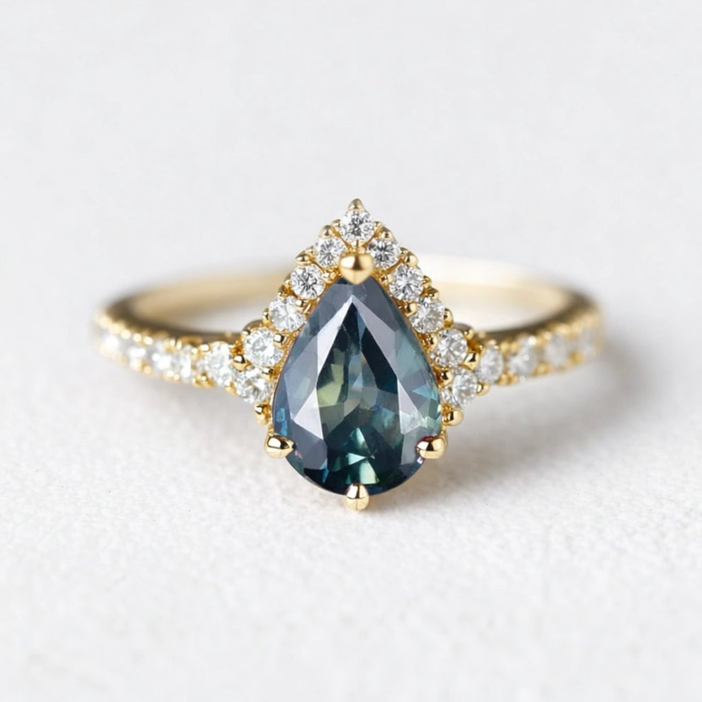 Aurora’s Teardrop | Pear Blue Sapphire Half-Halo Ring.