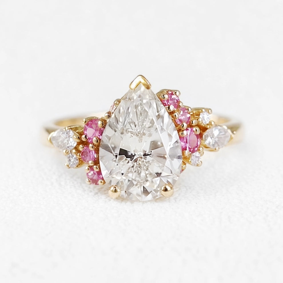Aurora’s Kiss | 2CT Pear Cut Diamond Gold Engagement Ring.