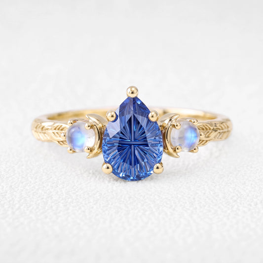 Asteria’s Moonveil | Pear Fantasy-Cut Royal Blue Sapphire & Moonstone Filigree Engagement Ring