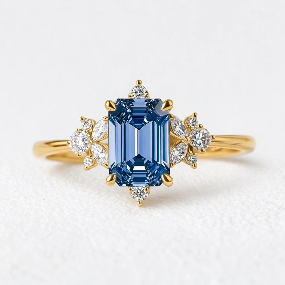 Lyra’s Cadence | 2CT Vintage Emerald Cut Blue Sapphire Ring.
