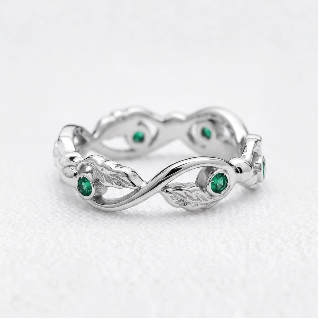 The Lacy Oak | Openwork Oak Leaves & Natural Emerald Women's Wedding Band.