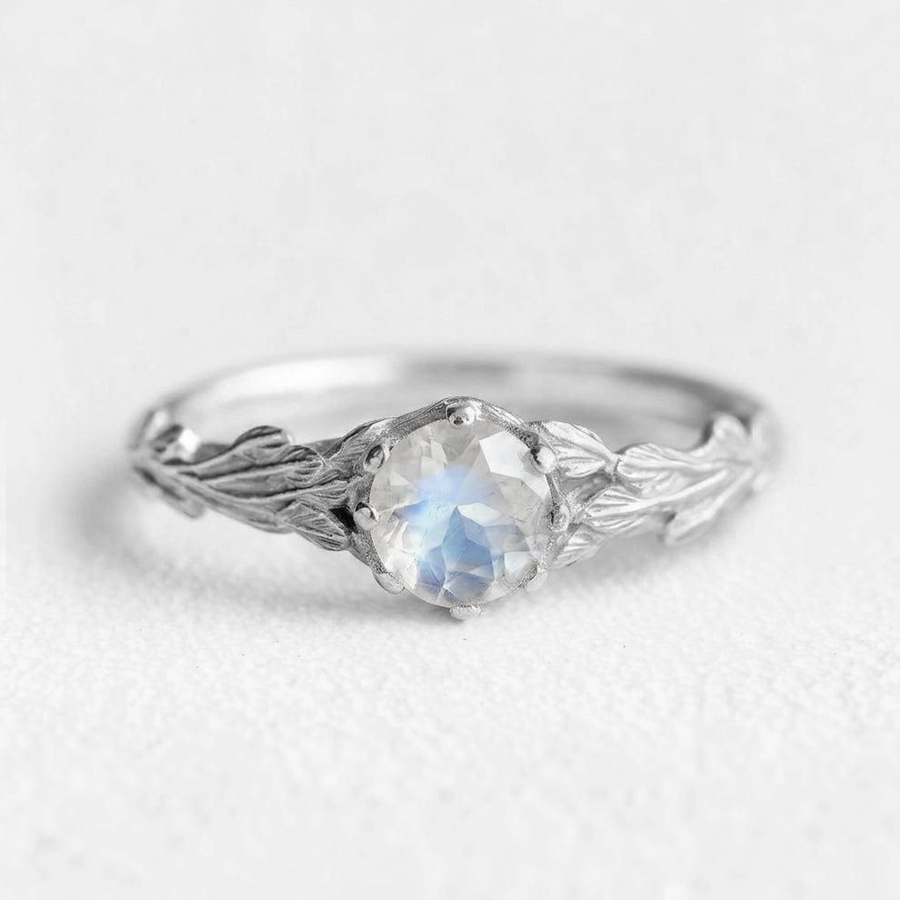 Athena’s Wings | Round Moonstone Olive Branch Engagement Ring.