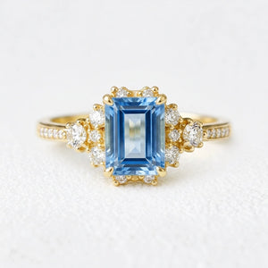 Rosalind‘s Coronet | Emerald Cut Sapphire Halo Engagement Ring