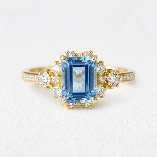 Rosalind‘s Coronet | Emerald Cut Sapphire Halo Engagement Ring