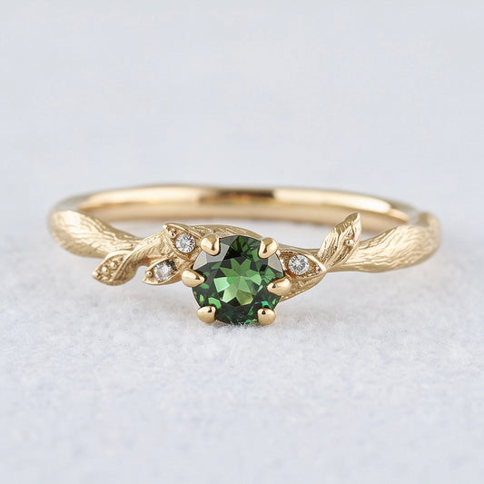 Fairy Glen | Teal Sapphire Engagement Ring with Leaf Band.