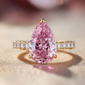 Aurora‘s Grace | 3CT Pear Cut Pink Solitaire Ring.