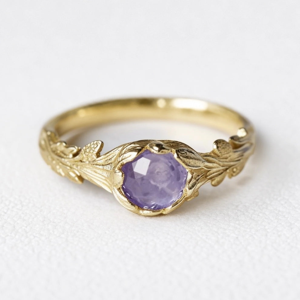 Daphne’s Branch | Round Tanzanite Engagement Ring with Sculptural Vine Band.