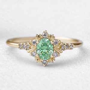 Isolde’s Enchantment | Vintage Oval Green Sapphire Halo Engagement Ring
