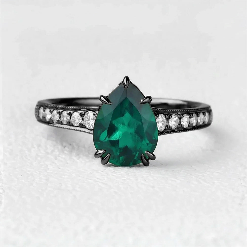 Olive’s Whisper | 1.5CT Classic Pear Cut Lab Emerald Engagement Ring.