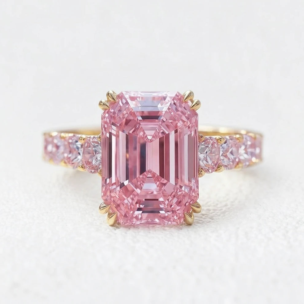 Aurora’s Aureole | 3CT Emerald Cut Pink Sapphire Engagement Ring