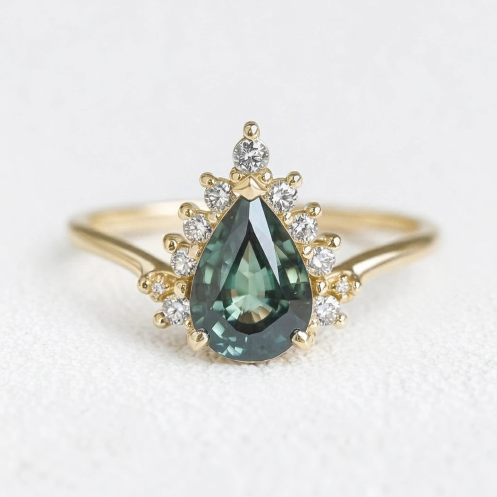 Mermaid’s Crown | Pear Teal Sapphire Halo Engagement Ring.