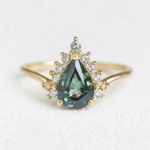 Mermaid’s Crown | Pear Teal Sapphire Halo Engagement Ring.