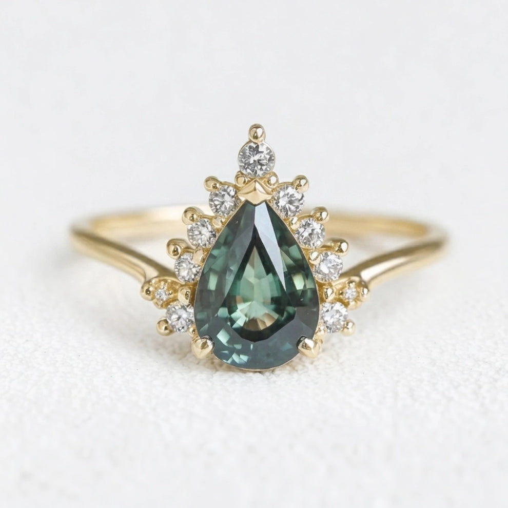 Mermaid’s Crown | Pear Teal Sapphire Halo Engagement Ring.