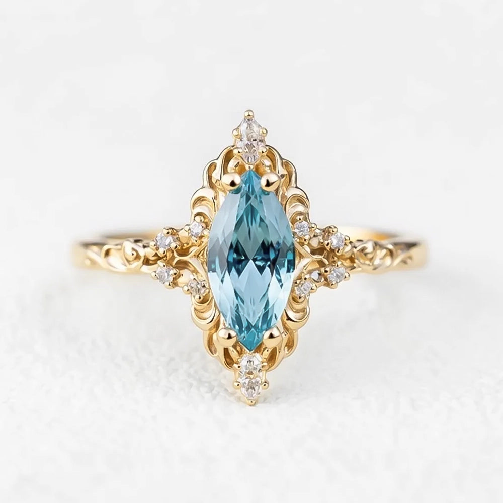 Aurora’s Swirl | Vintage Marquise Aquamarine Filigree Engagement Ring.