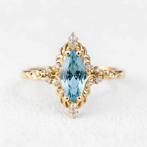 Aurora’s Swirl | Vintage Marquise Aquamarine Filigree Engagement Ring.
