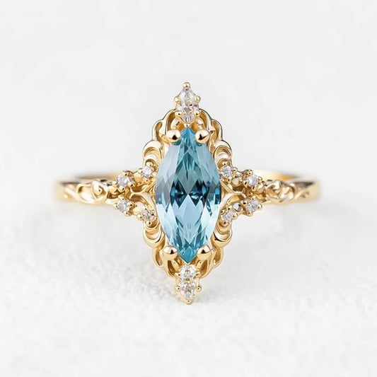 Aurora’s Swirl | Vintage Marquise Aquamarine Filigree Engagement Ring.