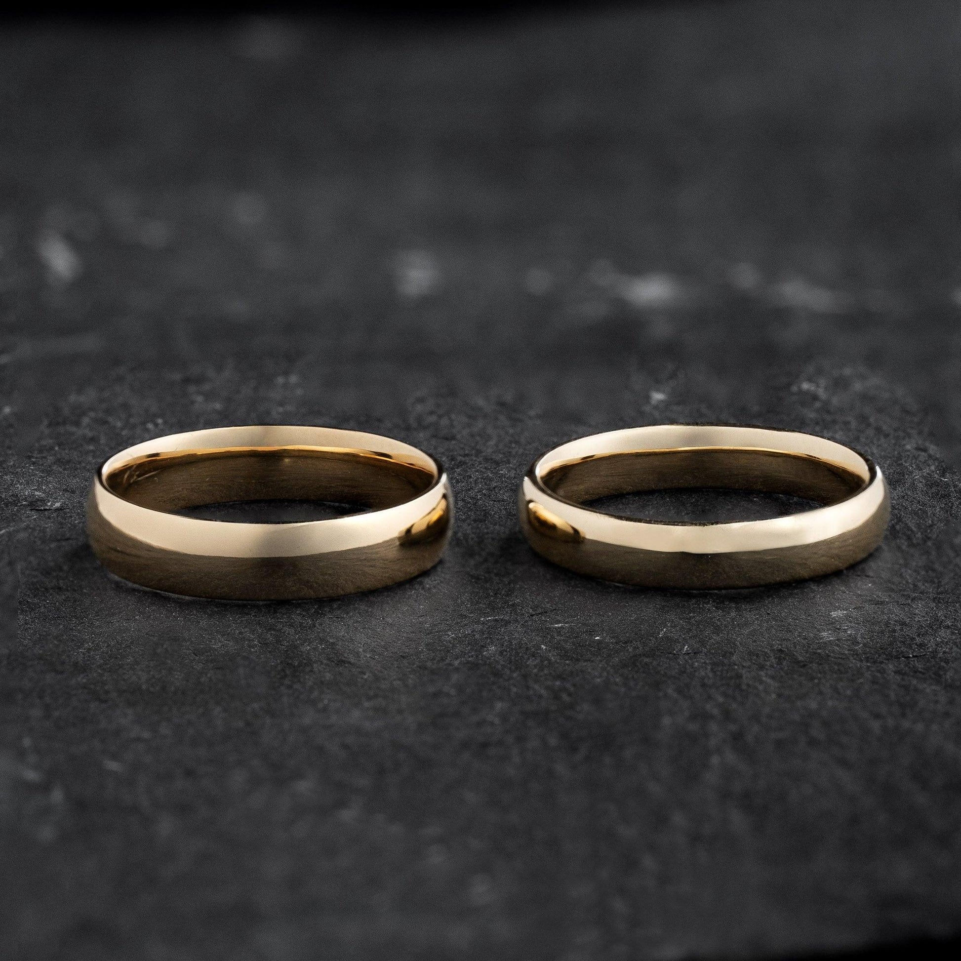 The Mirrored Pair – Polished Arc Wedding Bands in Solid Gold.