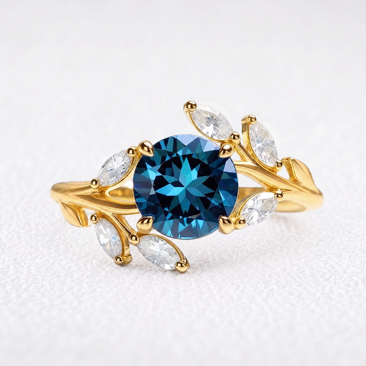 Eleonora’s Radiance | Round Blue Sapphire Vine Engagement Ring
