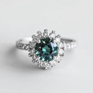 Stella’s Twilight | Blue Sapphire Halo Engagement Ring.