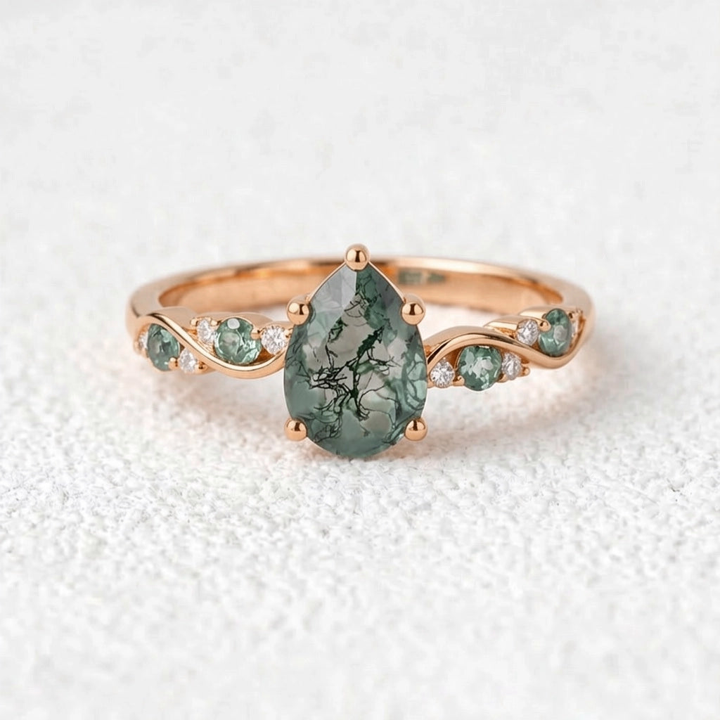 Flora’s Sprig | Pear Cut Moss Agate Engagement Ring.