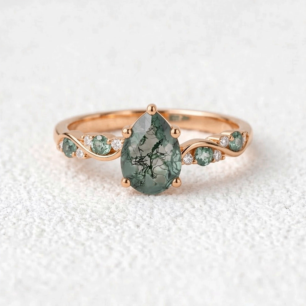 Flora’s Sprig | Pear Cut Moss Agate Engagement Ring.