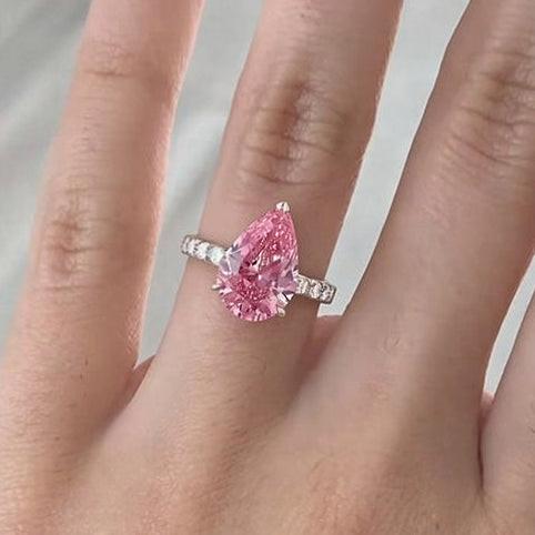 Aurora‘s Grace | 3CT Pear Cut Pink Solitaire Ring.
