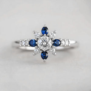 Sylvia‘s Floret | Blue Sapphire Petal Engagement Ring.