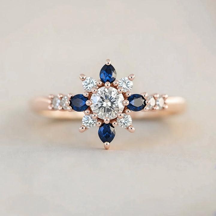 Sylvia‘s Floret | Blue Sapphire Petal Engagement Ring.