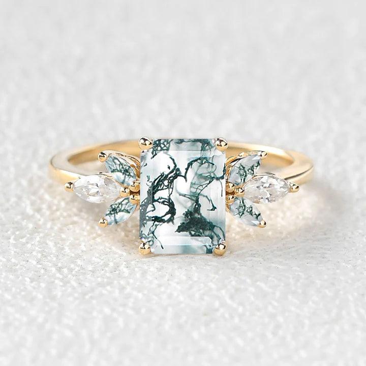 Aethra’s Pinions | Emerald Cut Moss Agate Cluster Wing Engagement Ring.