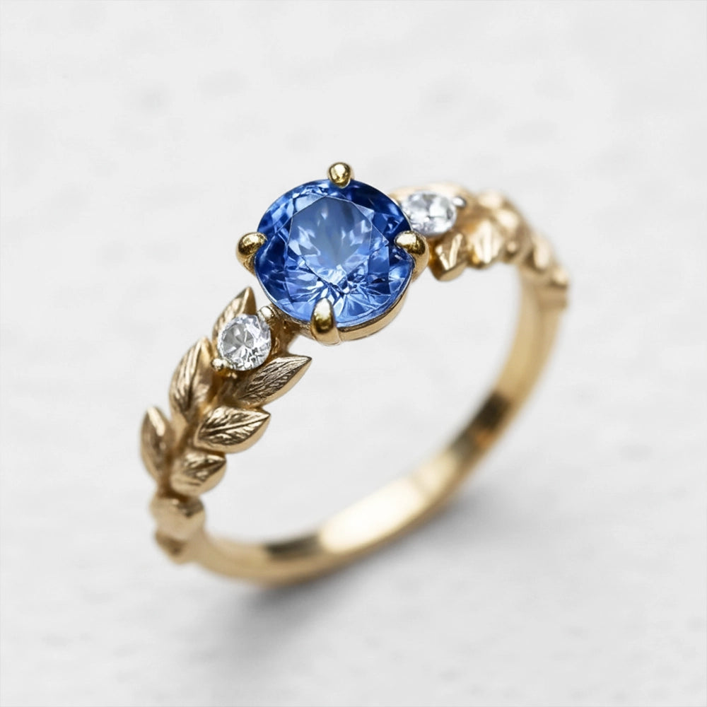 Iris’s Twilight | Blue Sapphire Solitaire Engagement Ring.