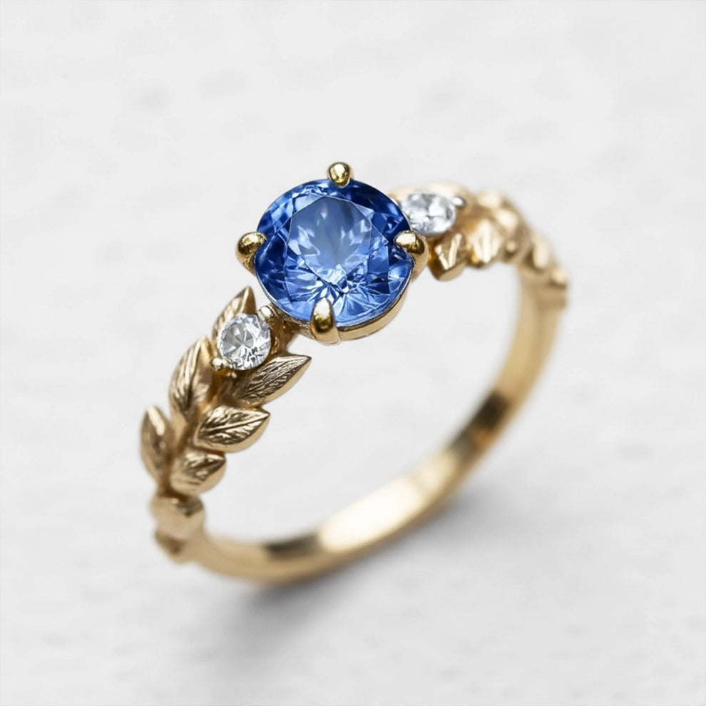 Iris’s Twilight | Blue Sapphire Solitaire Engagement Ring.