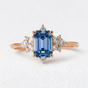 Lyra’s Cadence | 2CT Vintage Emerald Cut Blue Sapphire Ring.