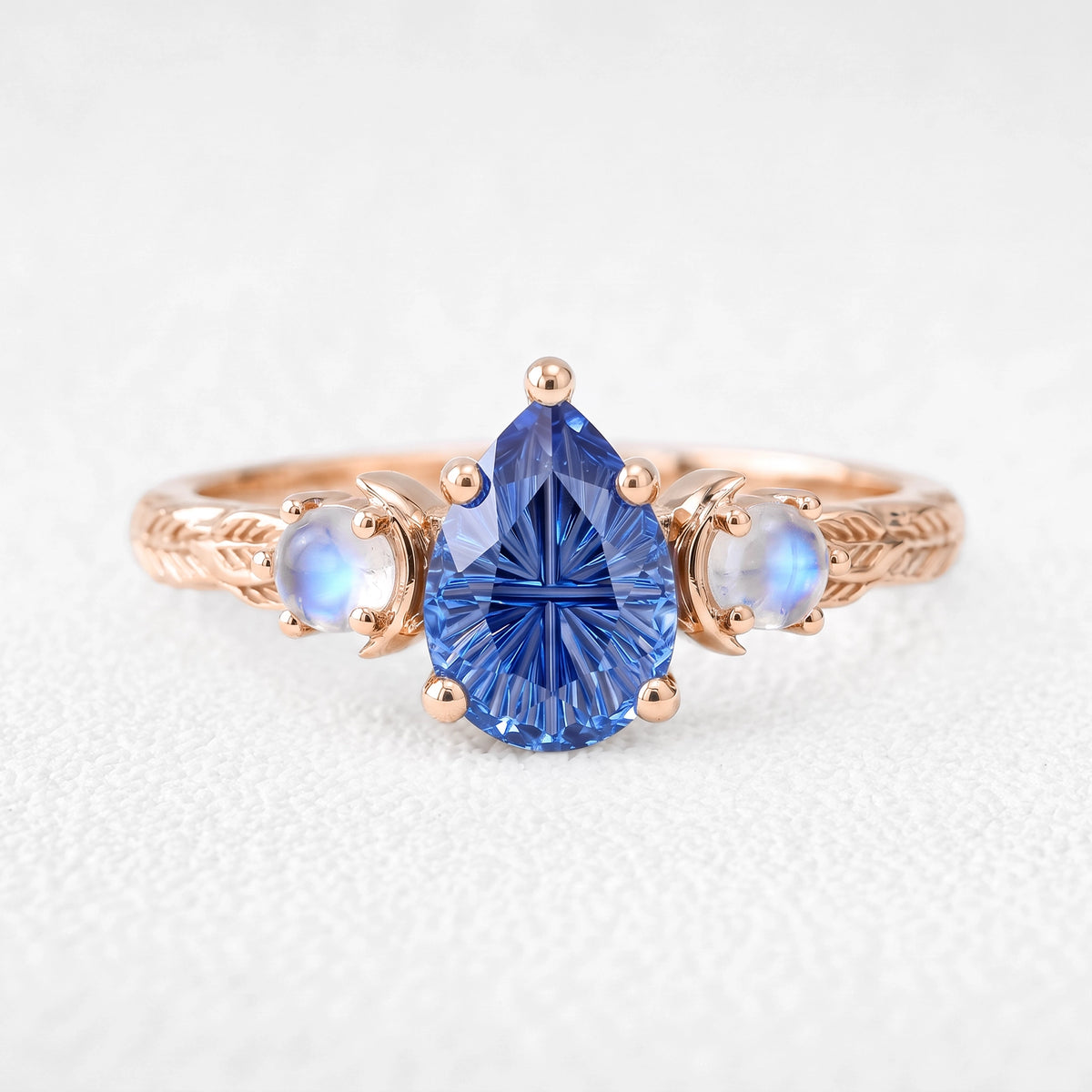 Asteria’s Moonveil | Pear Fantasy-Cut Royal Blue Sapphire & Moonstone Filigree Engagement Ring