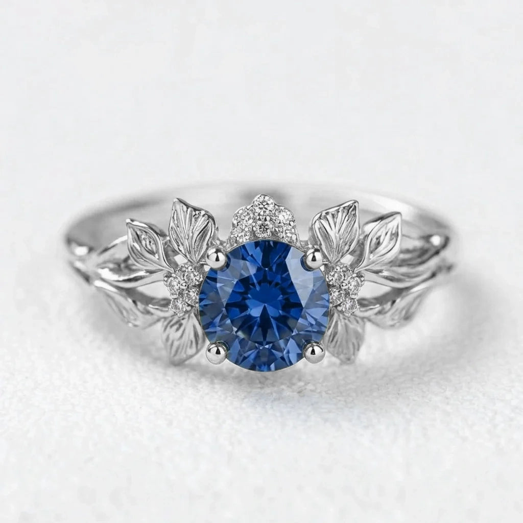 Valentina’s Blossom | Blue Sapphire Antique Floral Halo Ring.