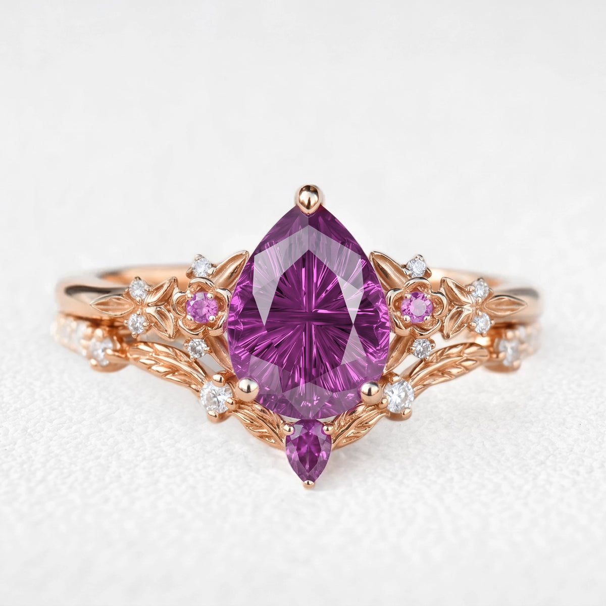 Theodora’s Diadem | Pear Fantasy-Cut Purple Sapphire Foliage Chevron Bridal Duo
