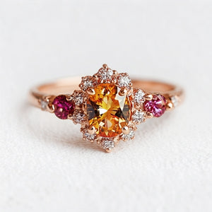 Flora's Wreath | Oval Mandarin Garnet & Multi‑Stone Halo Engagement Ring.