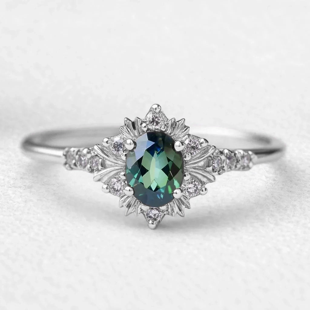 Rosalind‘s Bloom | Oval Cut Green Moissanite Halo Engagement Ring.