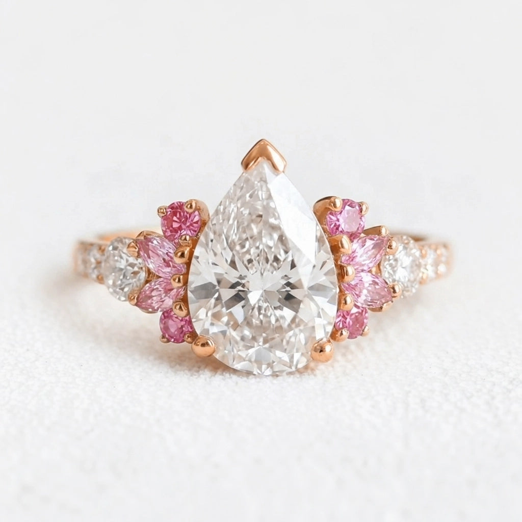 Vivienne’s Soar | 3CT Pear Diamond Engagement Ring with Marquise Accents.