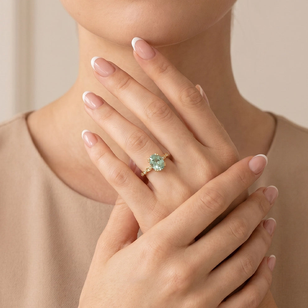 Lydia's Lace | 2CT Oval Green Sapphire Engagement Ring with Lace-Trim Diamond Band.
