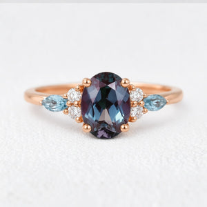Theodora’s Rhapsody | Oval Alexandrite & Topaz Engagement Ring