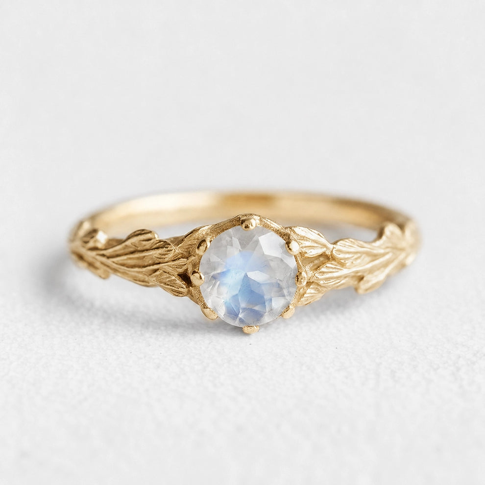 Athena’s Wings | Round Moonstone Olive Branch Engagement Ring.