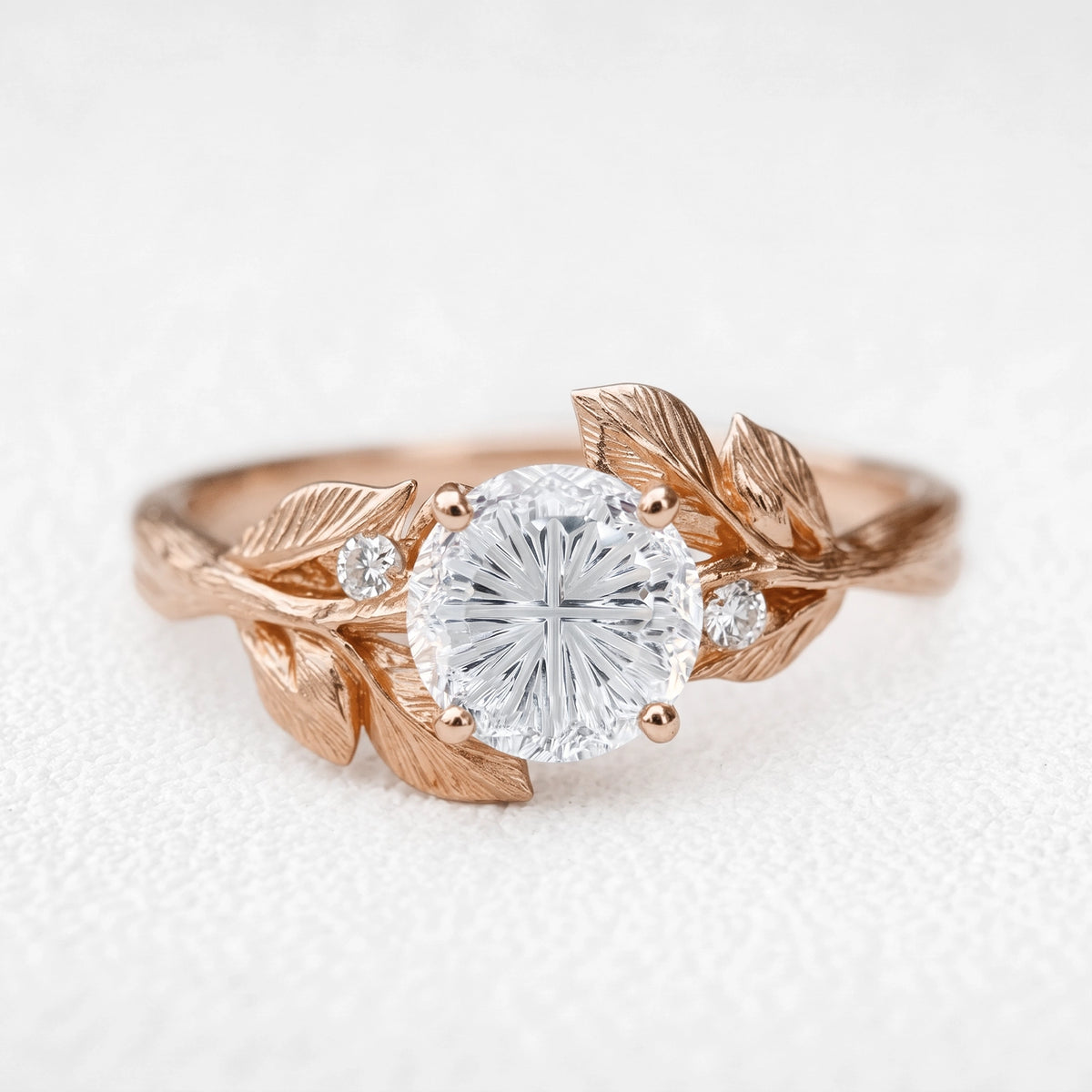 Daphne’s Dawn | Round Fantasy-Cut White Sapphire Foliage Engagement Ring