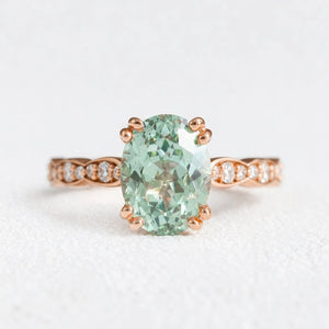 Lydia's Lace | 2CT Oval Green Sapphire Engagement Ring with Lace-Trim Diamond Band.