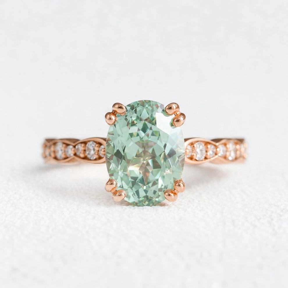 Lydia's Lace | 2CT Oval Green Sapphire Engagement Ring with Lace-Trim Diamond Band.