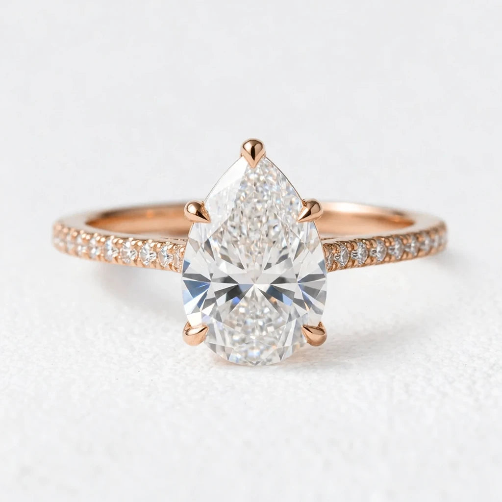 Aurelia's Radiance | 1.5CT Pear Diamond Pavé Solitaire Engagement Ring