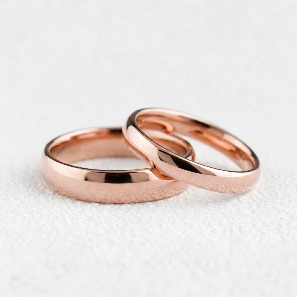 The Mirrored Pair – Polished Arc Wedding Bands in Solid Gold.