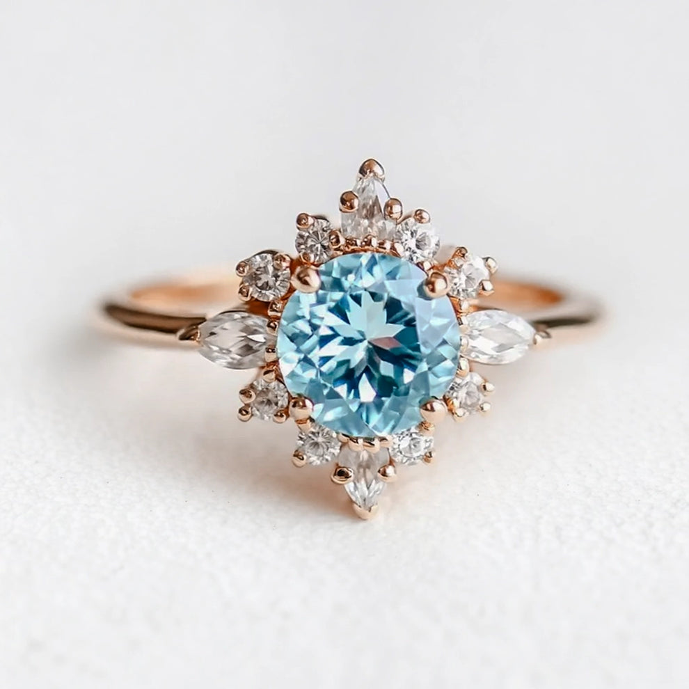 Marina's Swell | Round Cut Aquamarine Halo Engagement Ring.
