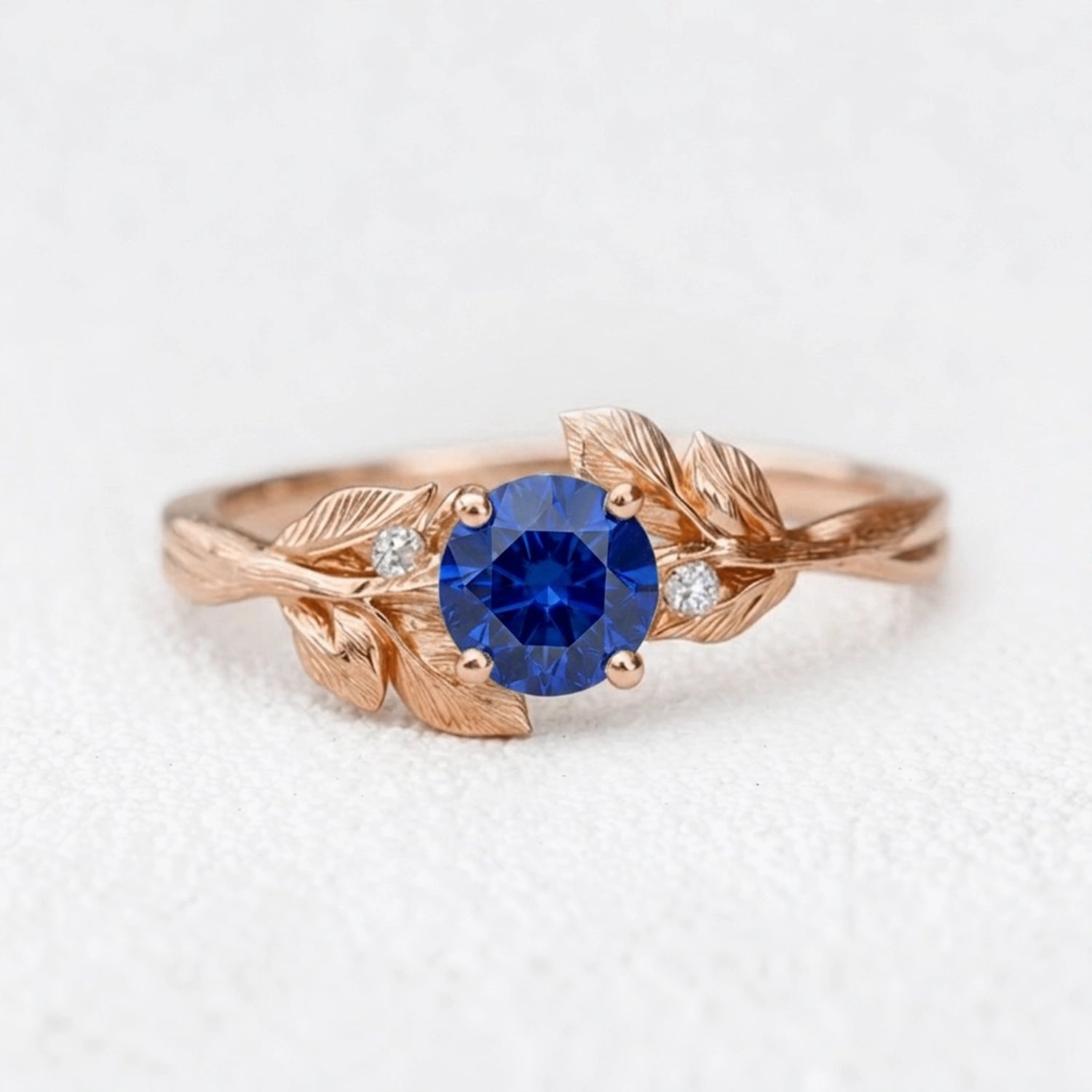 Celine‘s Blossom | Round Cut Blue Sapphire Engagement Ring